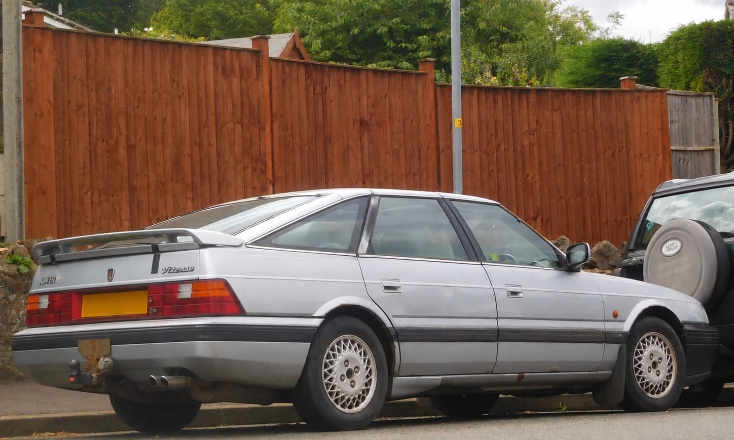 A silver 1991 Rover 800 XX fastback with a UK registration parked outside a house