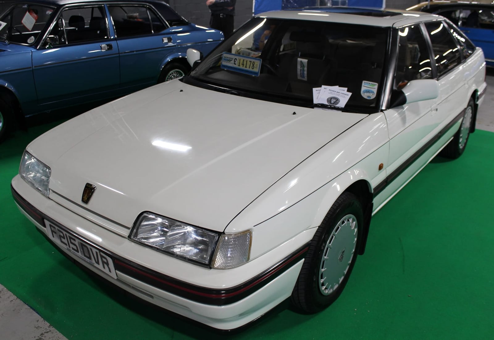 A white Rover 800 XX fastback with a UK registration parked on a show field
